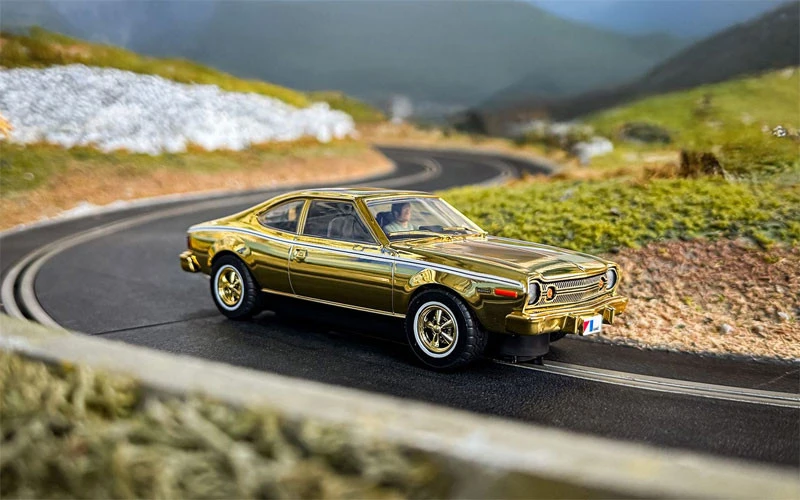 Scalextric James Bond AMC Hornet - The Man With The Golden Gun - 50th Anniversary Gold Edition 1/32 Slot Car 4 Scalextric James Bond AMC Hornet - The Man With The Golden Gun - 50th Anniversary Gold Edition 1/32 Slot Car - Image 2